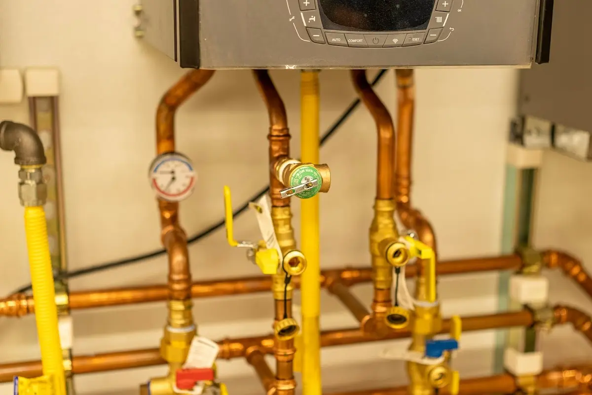 Licensed technician providing Backflow Prevention for a homeowner in Ives Estates